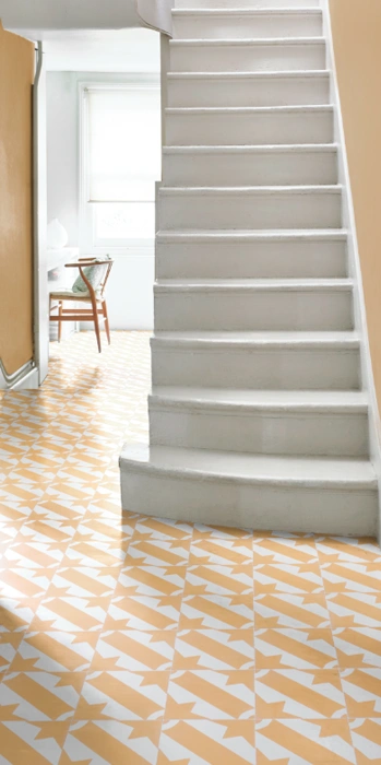 Stairway featuring yellow cement tile floor